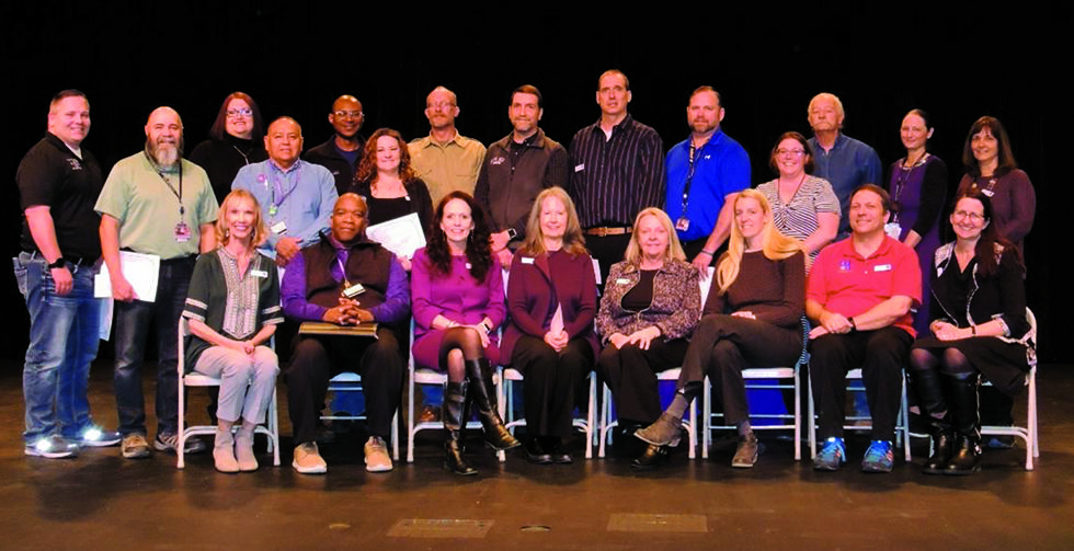 Tarpley Award Recipients of San Juan College sitting in a group posed for a photo.